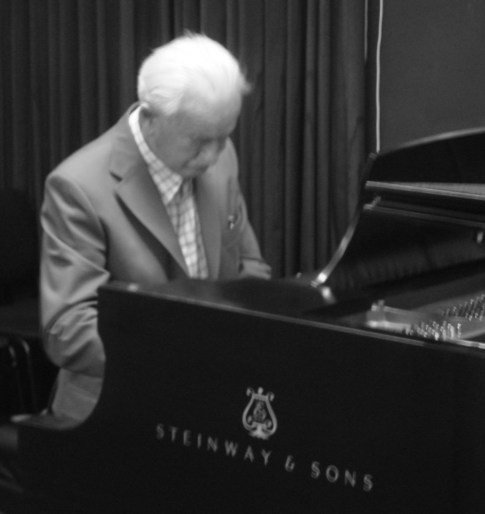 Ernst Mahle playing a piano at Steinway Hall, New York, NY